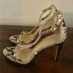 SOLD! Black and White Heels with Strappy Design.